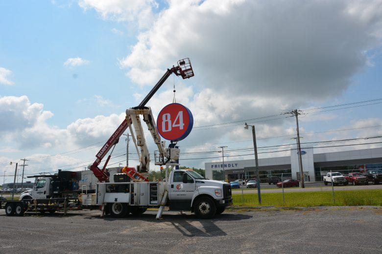 84 Lumber Logo Sign