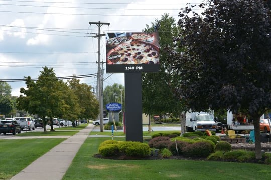 An outdoor digital message center for a pizza restaurant (1)