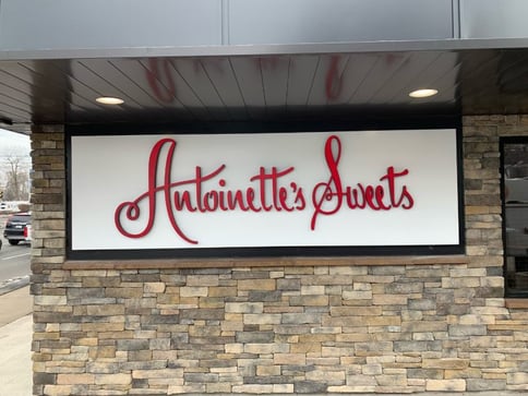 Antoinettes Sweets Sign to Promote Brand Equity (1)