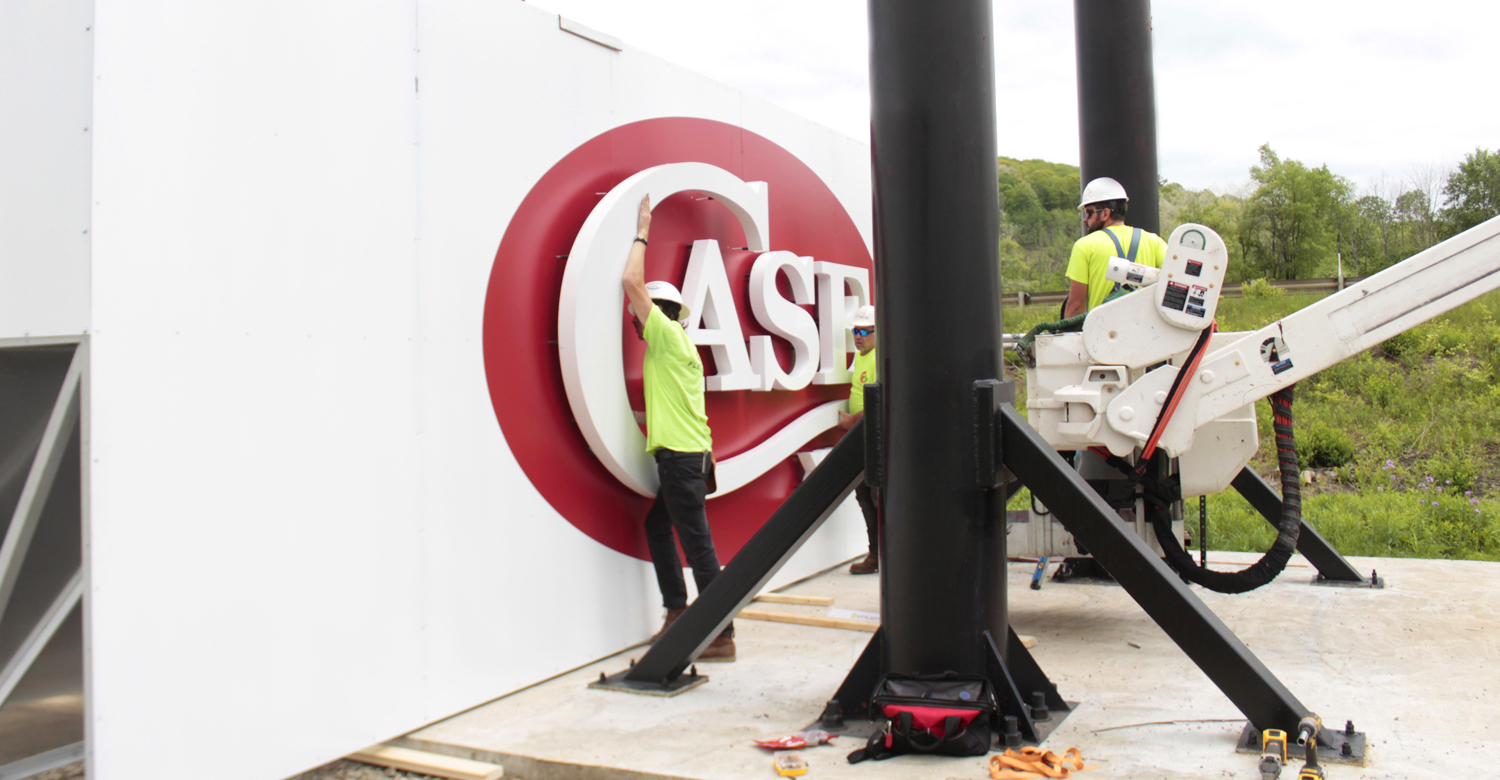 Zippo Lighter - Case Knives - Highway Pole Sign Installation