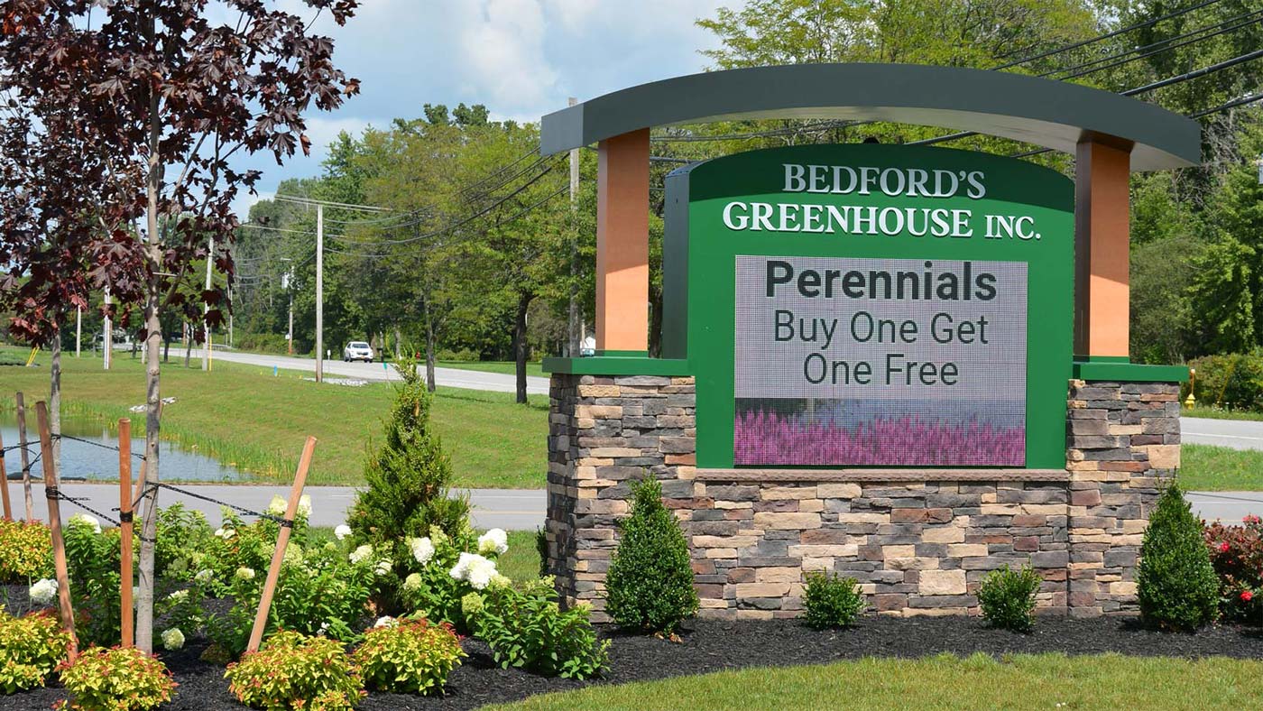 Outdoor digital signage for Bedford's Greenhouse by Flexlume