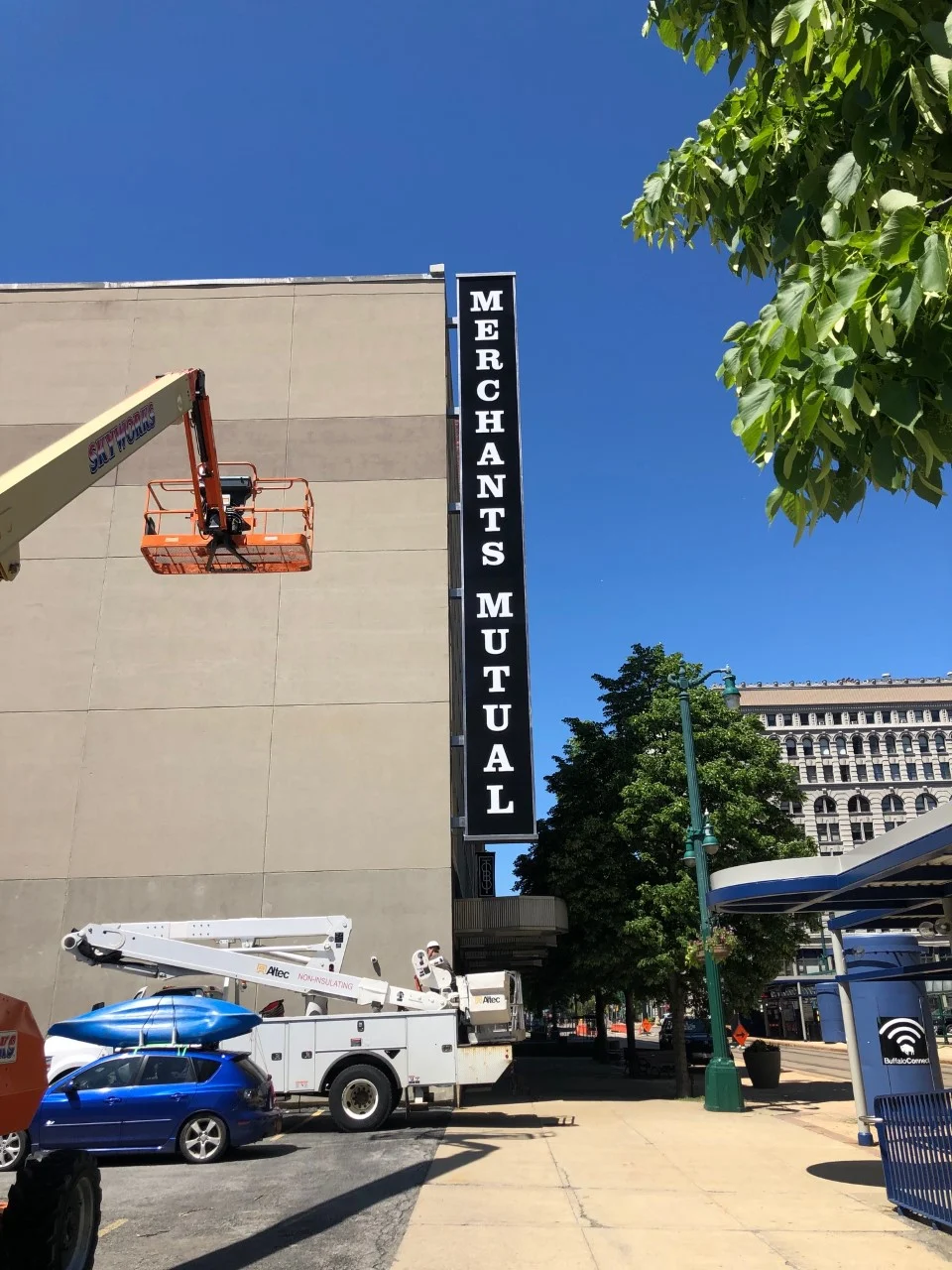 Merchants Mutual backlit push through letter sign installation